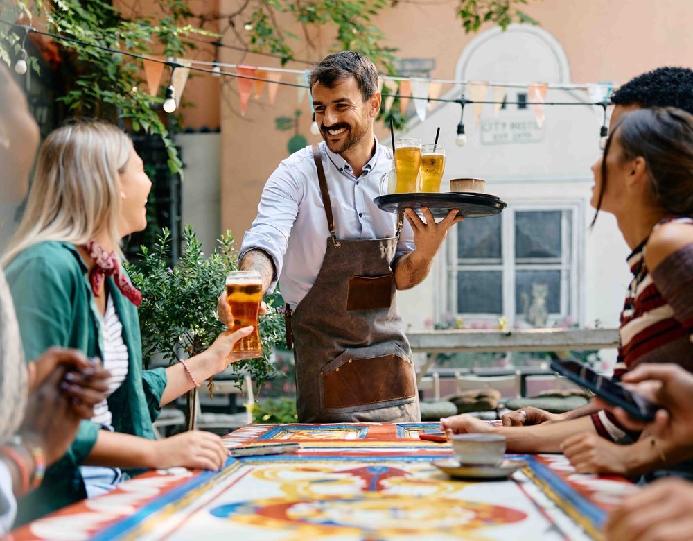 Guests being served at an outdoor venue